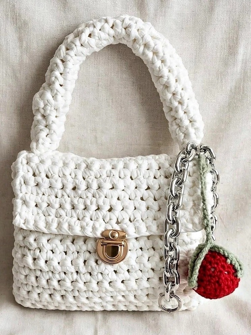 Crochet Shoulder Bag in White and a red charm